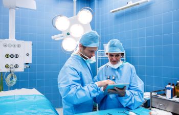 Plastic Surgeons Consulting in Operating Room Atlanta GA